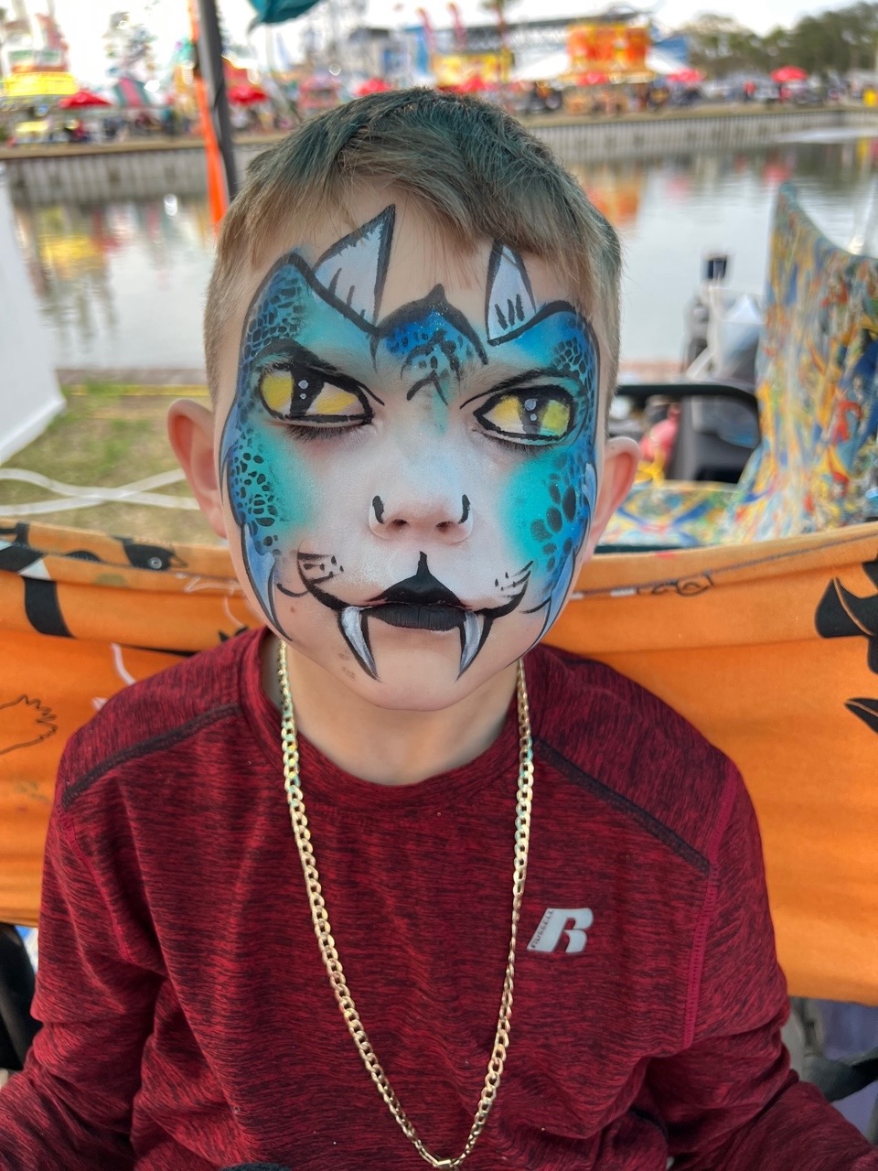 child with face paint